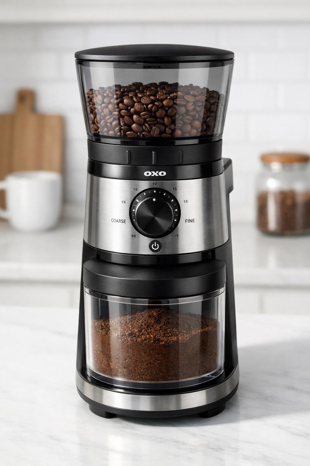 OXO Brew conical burr coffee grinder with one-touch timer on a kitchen counter